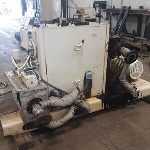 Industrial machinery in a workshop setting.