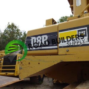Construction equipment with "Road Builders Supply" logo.