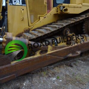 Close-up of a bulldozer's metal tracks.