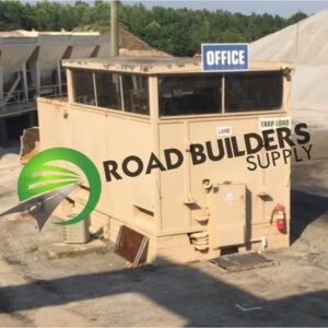 Construction site office with "Road Builders Supply" logo.