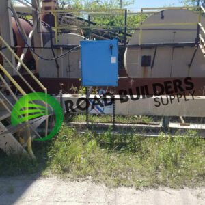 Industrial machinery with blue control box outdoors.