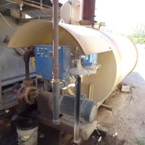 Industrial machinery with pipes and control panels.