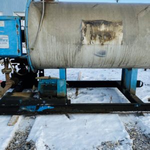 Industrial equipment on snowy ground outdoors.