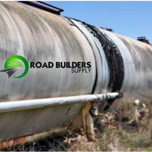 Rusty tanker with Road Builders Supply logo.