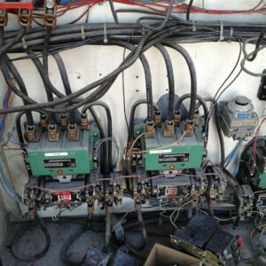 Electrical control panel with numerous wires connected.