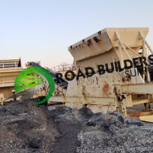 Industrial machinery in a construction site landscape.