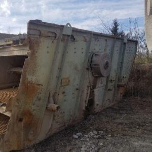 Rusty industrial equipment in an outdoor setting.