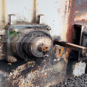 Rusted industrial machinery with metal components.