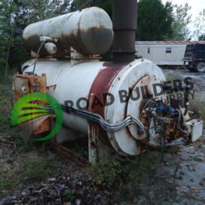 Old rusted asphalt heater tank with piping