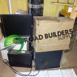 Stacked computer monitors and a cardboard box.