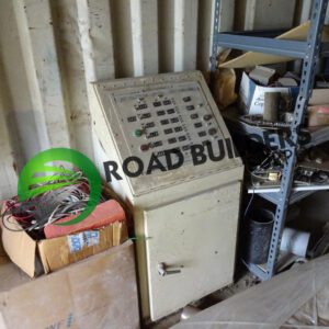 Old control panel in storage area.