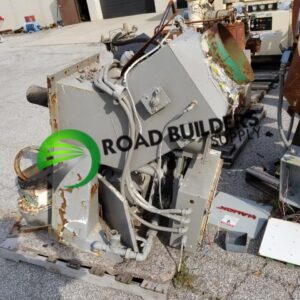 Old industrial equipment with "Road Builders Supply" logo.
