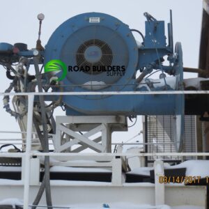 Industrial machinery with snow and railing.
