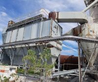 Industrial machinery with metal structures and pipes.
