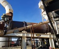 Industrial machinery under clear blue sky.