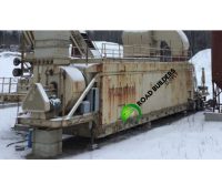 Industrial equipment in snowy outdoor setting.
