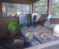 Road Builders Supply control room with equipment.