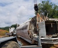 Cement truck overturned during recovery operation.