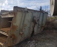 Rusty industrial equipment in an outdoor setting.