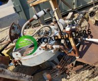 Industrial machinery parts with Road Builders logo.